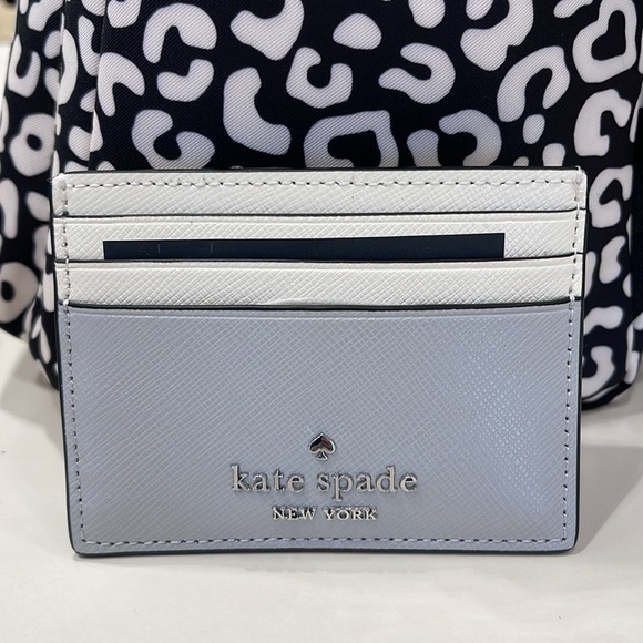 Kate Spade Madison Small Slim Card Holder
Platinum Grey Multi
NWT - Picture 11 of 16